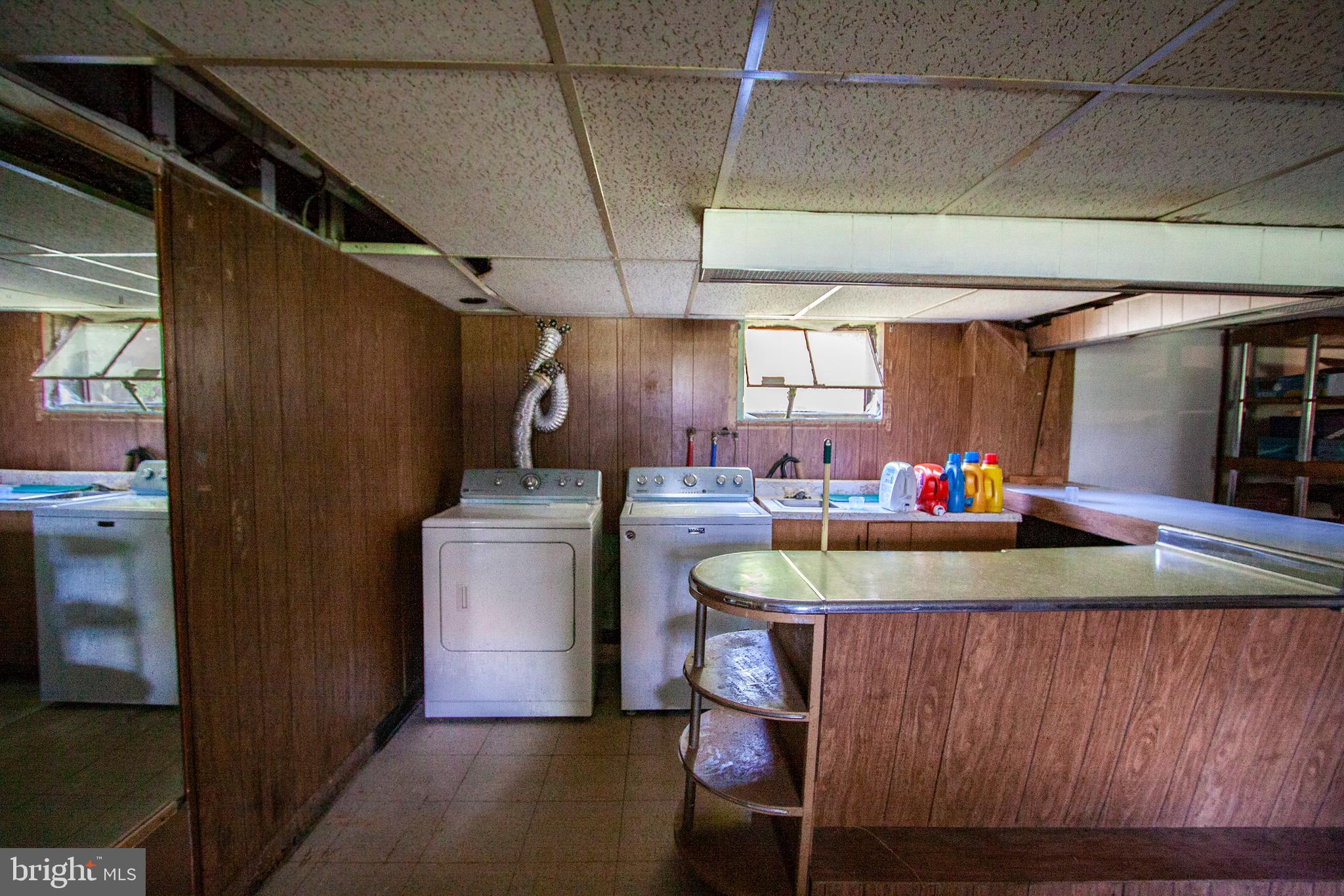 4703 Forge Road Perry Hall, MD 21128 - Photo 47 of 47 a dining room with a sink and a refrigerator