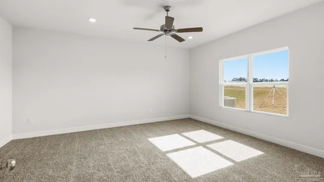 a bathroom with a sink toilet vanity and shower