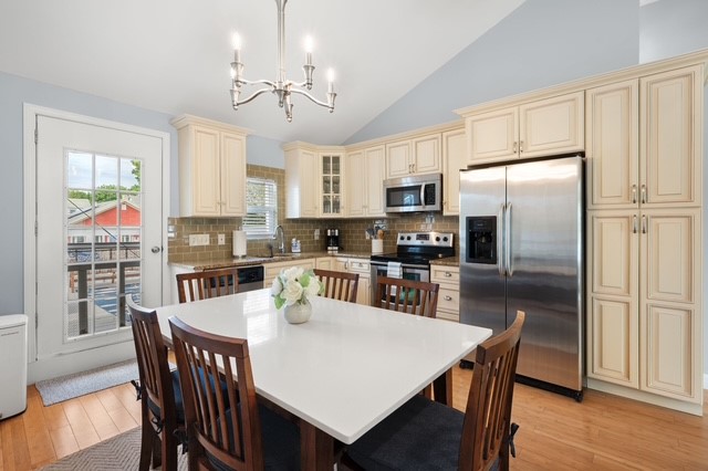 6 Richmond Drive, Unit 1 Westerly, RI 02891 - Photo 8 of 21 Dining table and Kitchen