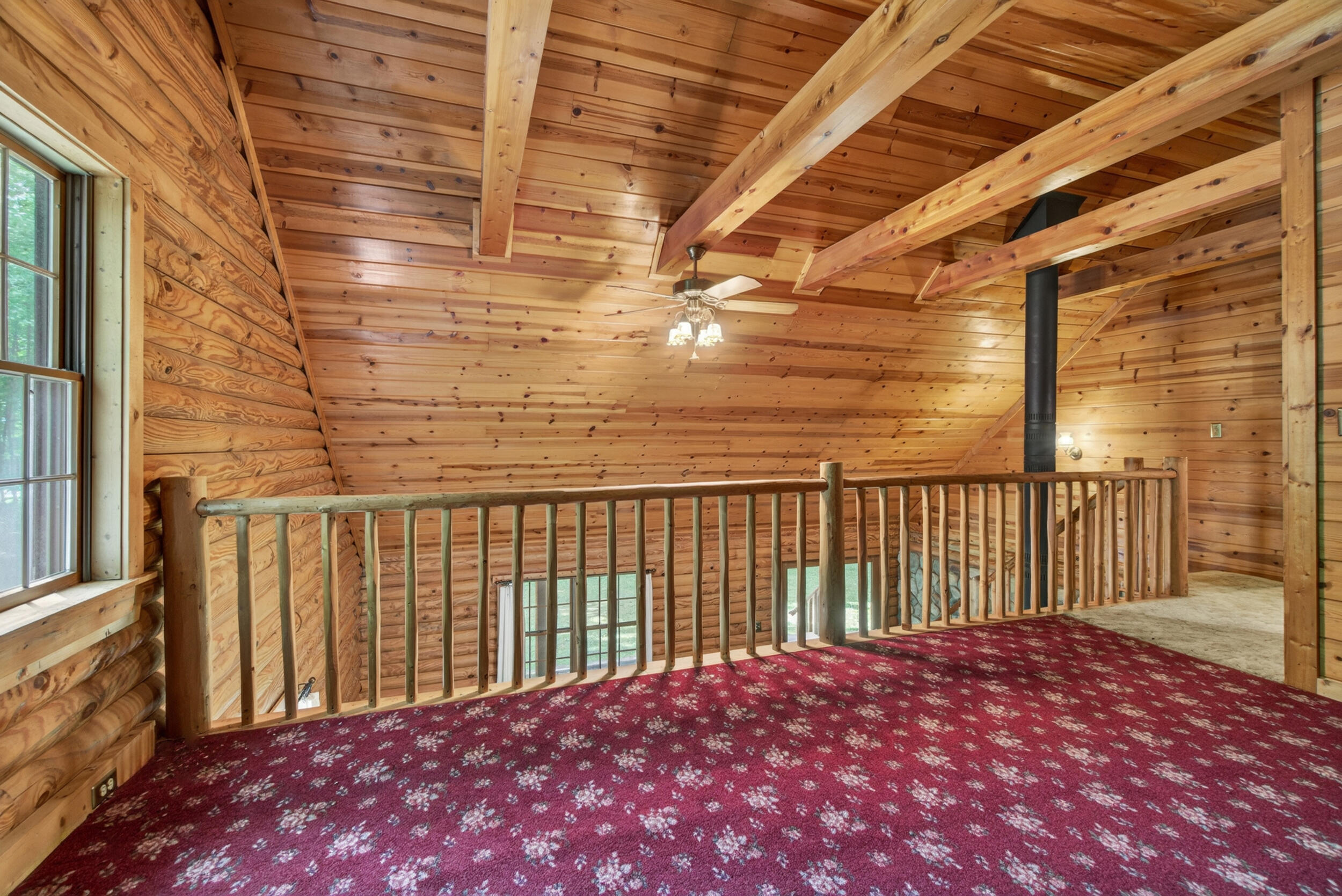 7789 Thorne Road Horton, MI 49246 - Photo 29 of 65 Second Floor Overlook into Living Area