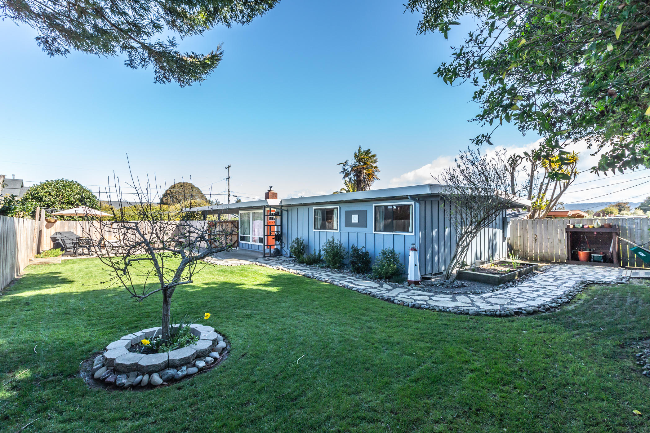 3372 Edgewood Road Myrtletown, CA 95501 - Photo 4 of 44 a front view of a house with garden