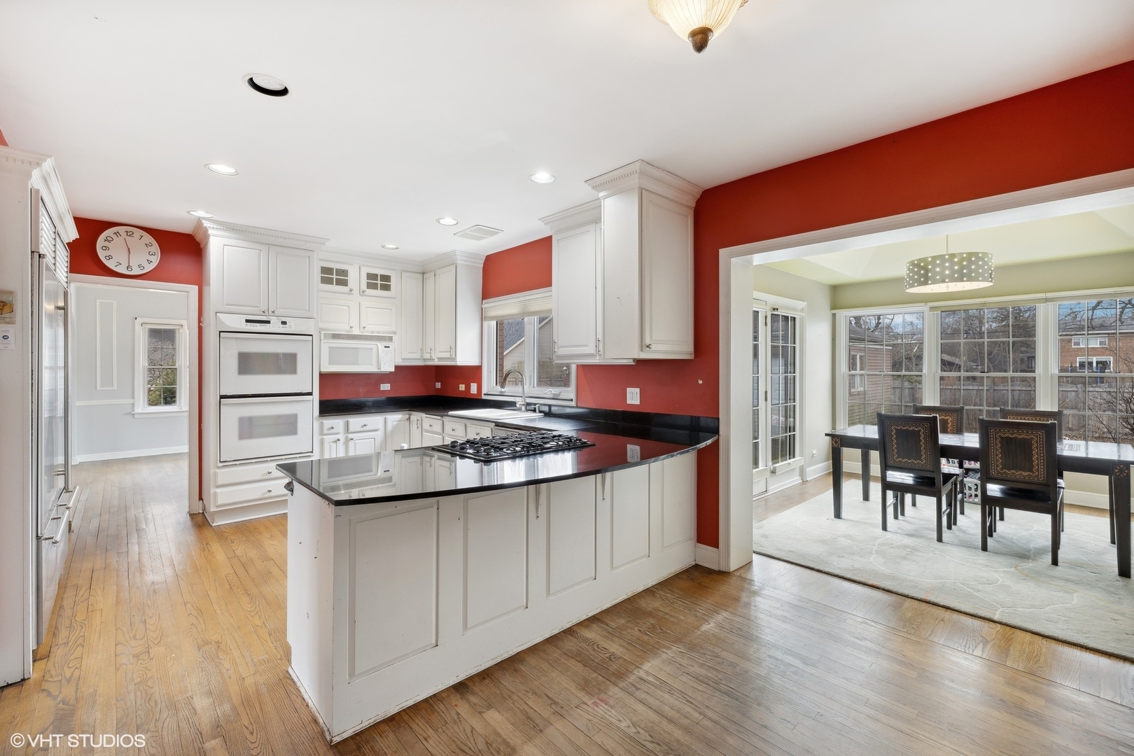 258 Nuttall Road Riverside, IL 60546 - Photo 13 of 32 a kitchen with stainless steel appliances granite countertop a stove and a refrigerator