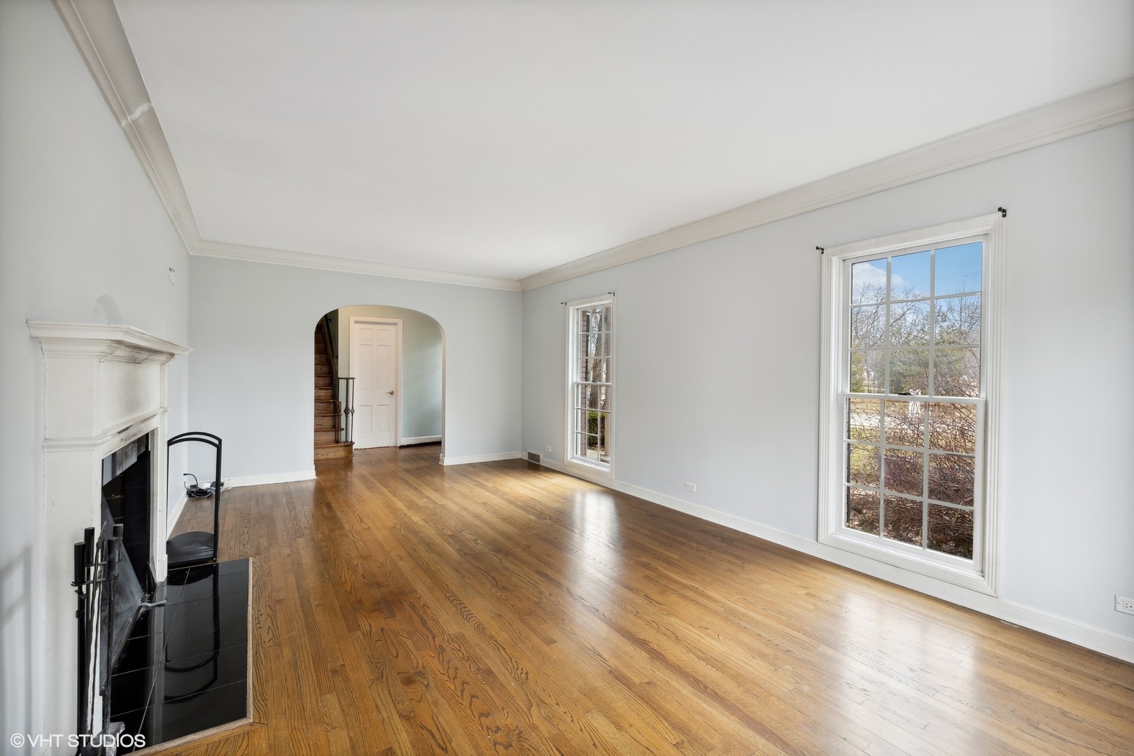 258 Nuttall Road Riverside, IL 60546 - Photo 6 of 32 an empty room with wooden floor and windows
