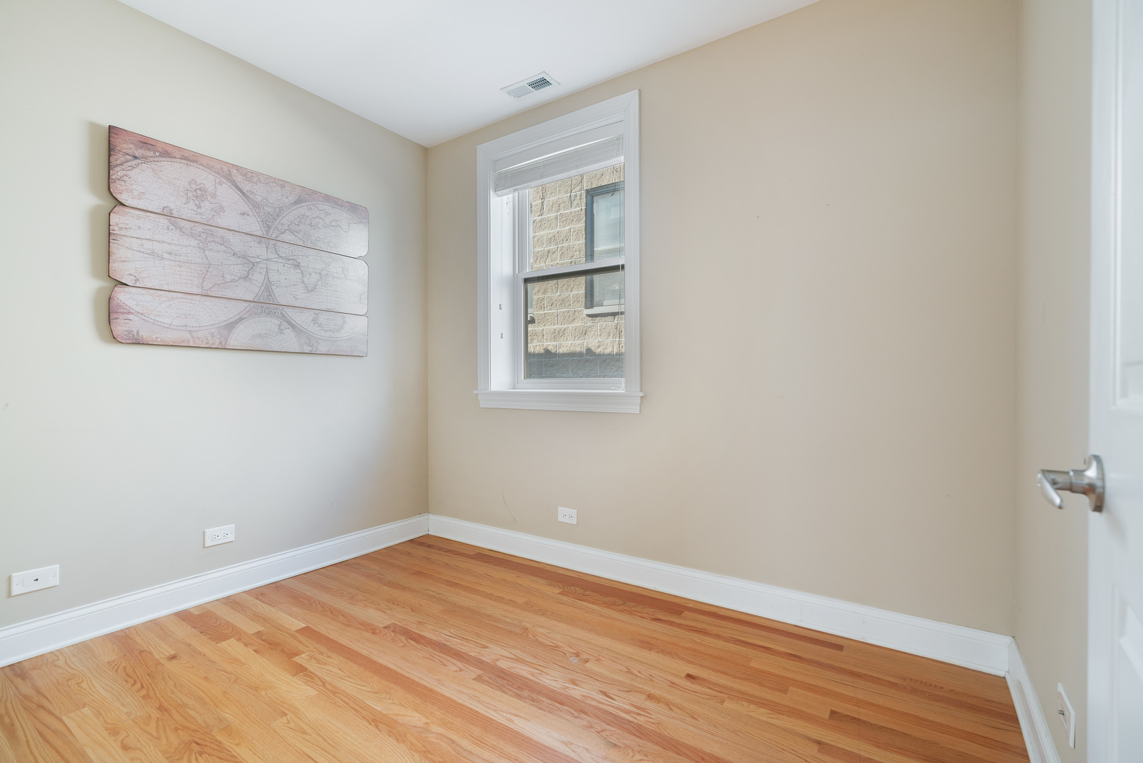 2142 West Addison Street, Unit 3B Chicago, IL 60618 - Photo 9 of 10 a view of a room that has a window in it