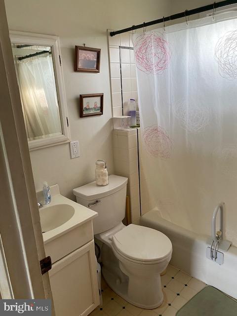 1497 Hilltop Road Pottstown, PA 19464 - Photo 11 of 25 a white toilet sitting next to a bathroom sink