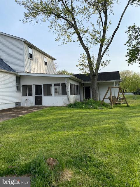 1497 Hilltop Road Pottstown, PA 19464 - Photo 20 of 25 a view of a house with a backyard