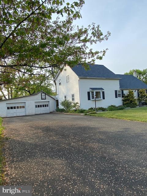 1497 Hilltop Road Pottstown, PA 19464 - Photo 3 of 25 a house view with a garden space