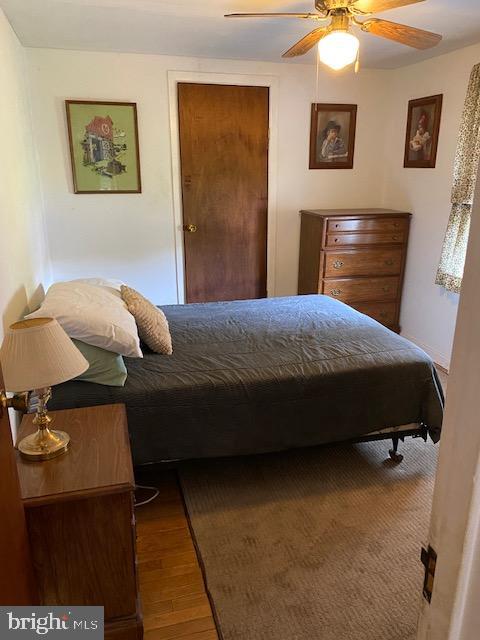 1497 Hilltop Road Pottstown, PA 19464 - Photo 9 of 25 a bedroom with a bed and cabinets