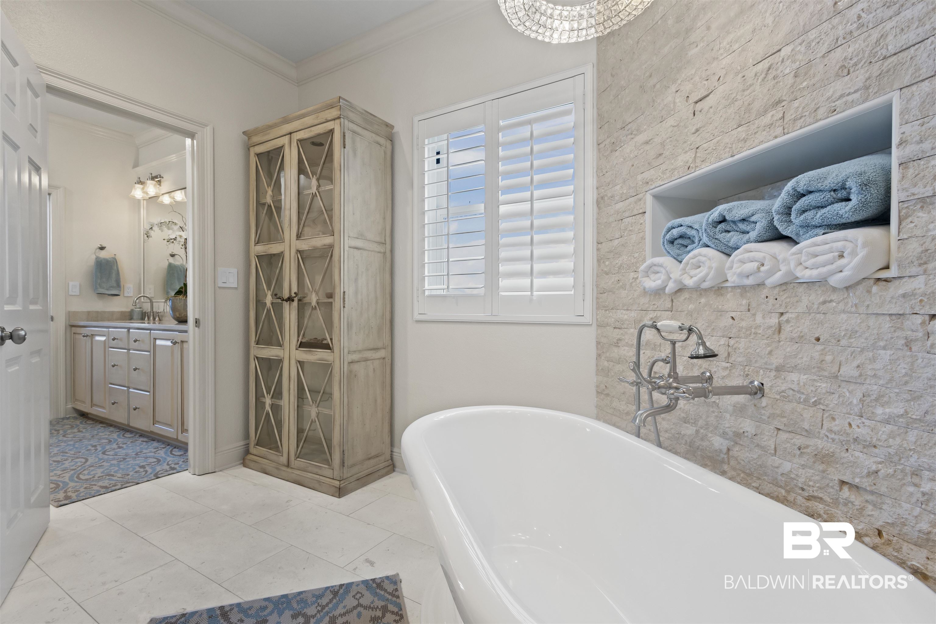 27800 Canal Road, Unit 120 Orange Beach, AL 36561 - Photo 24 of 68 Bathroom with tile patterned flooring, vanity, crown molding, and a tub to relax in