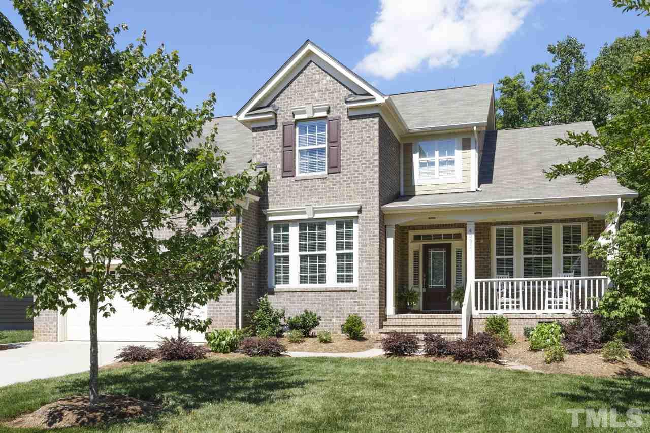4001 Red Grape Drive Raleigh, NC 27607 - Photo 1 of 25 front view of house with a yard