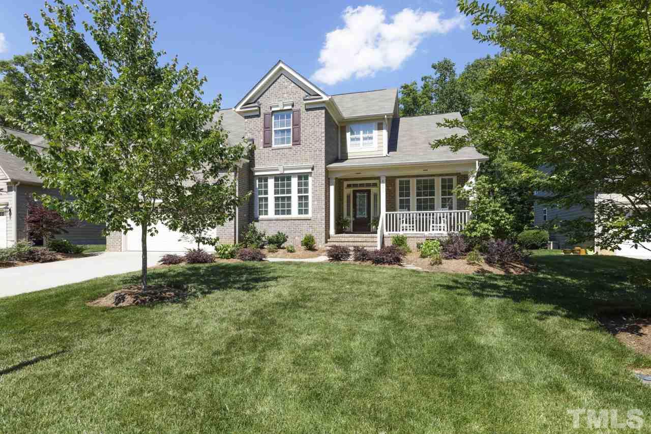 4001 Red Grape Drive Raleigh, NC 27607 - Photo 2 of 25 a front view of a house with a yard