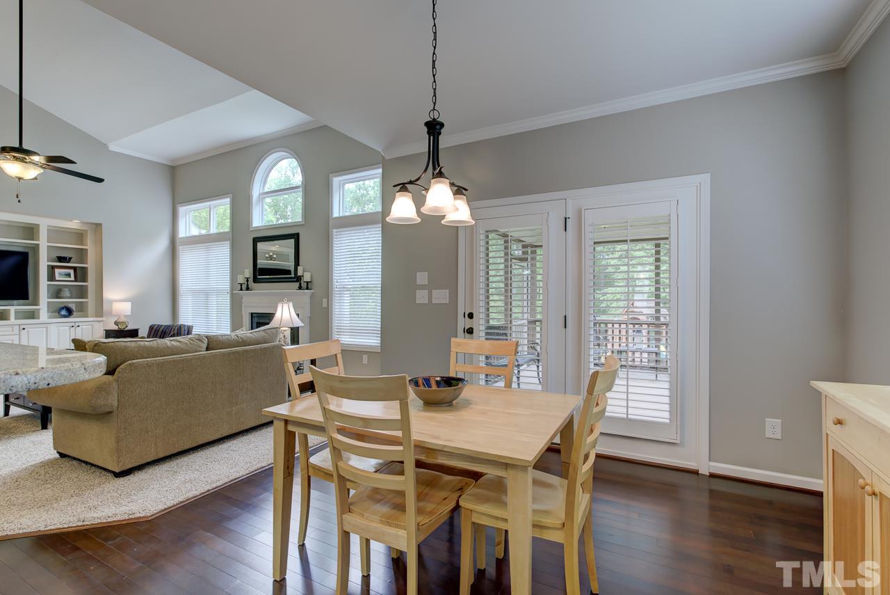 4001 Red Grape Drive Raleigh, NC 27607 - Photo 11 of 25 a view of a dining room with furniture window and wooden floor