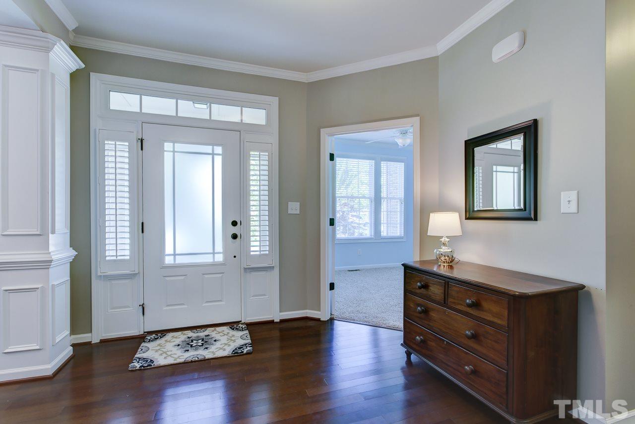 4001 Red Grape Drive Raleigh, NC 27607 - Photo 4 of 25 a view of a room with wooden floor and cabinet