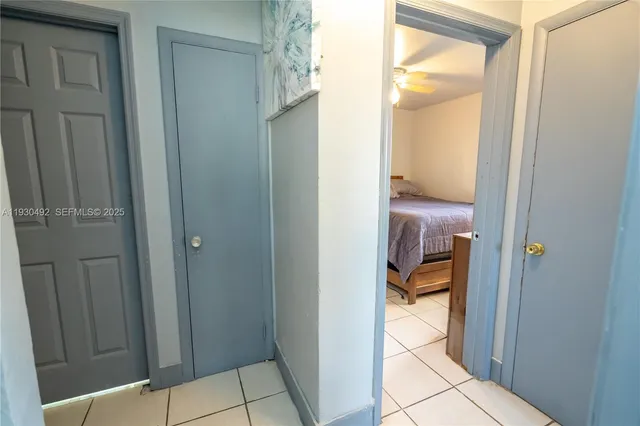 a view of a bathroom from a hallway