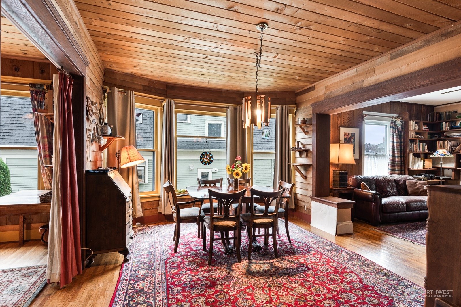 1211 Rucker Avenue Everett, WA 98201 - Photo 13 of 40 a view of a dining room with furniture window and outside view