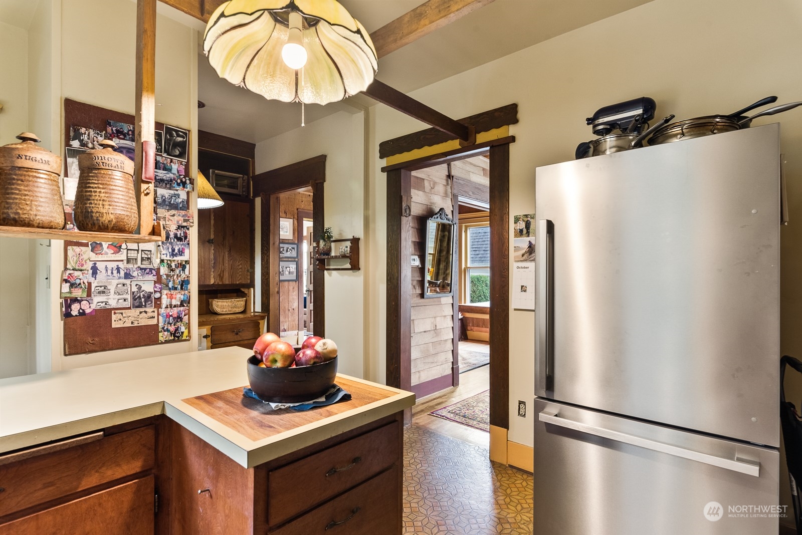 1211 Rucker Avenue Everett, WA 98201 - Photo 19 of 40 a kitchen with stainless steel appliances granite countertop a refrigerator and a sink