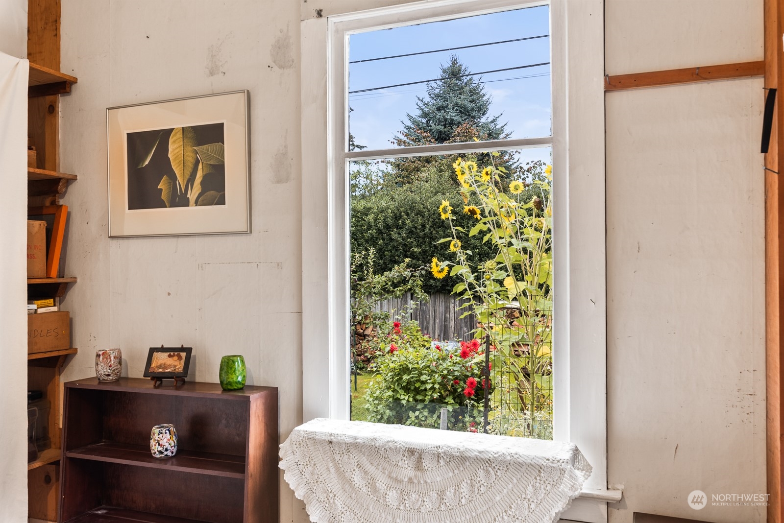 1211 Rucker Avenue Everett, WA 98201 - Photo 21 of 40 a window with flower in front of a window