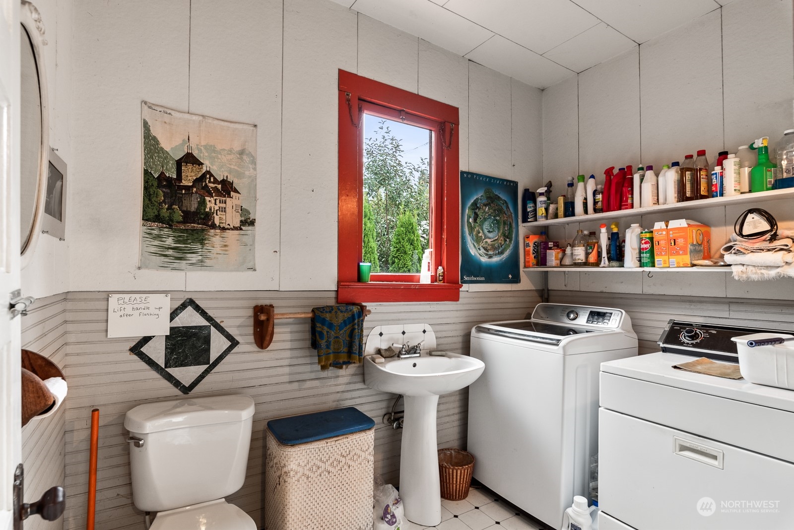 1211 Rucker Avenue Everett, WA 98201 - Photo 22 of 40 a bathroom with a sink and a toilet