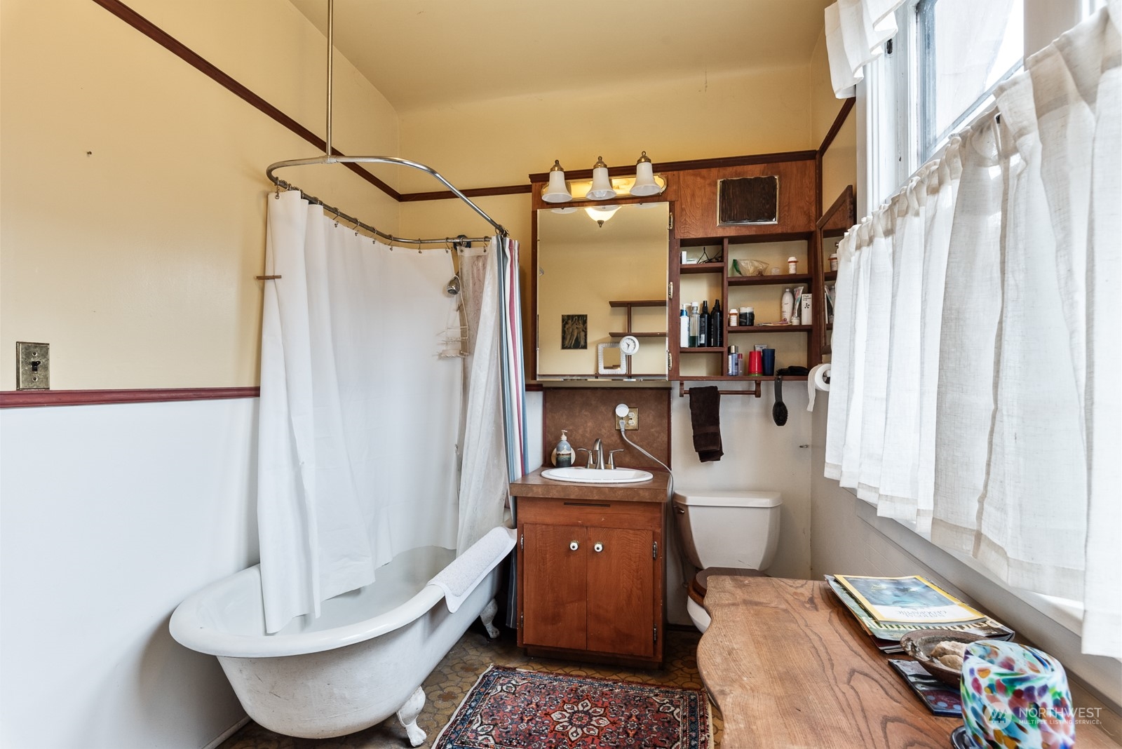 1211 Rucker Avenue Everett, WA 98201 - Photo 26 of 40 a bathroom with a toilet a sink and a shower