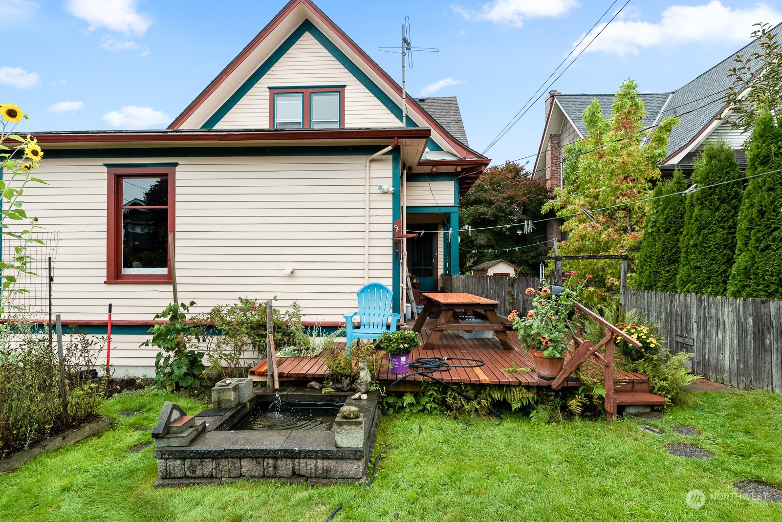 1211 Rucker Avenue Everett, WA 98201 - Photo 33 of 40 a front view of a house with a garden and plants