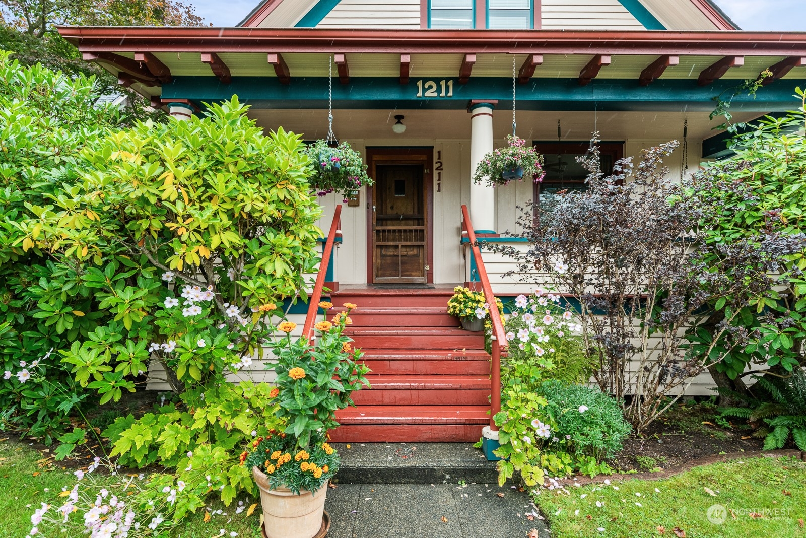 1211 Rucker Avenue Everett, WA 98201 - Photo 4 of 40 a front view of a house with plants