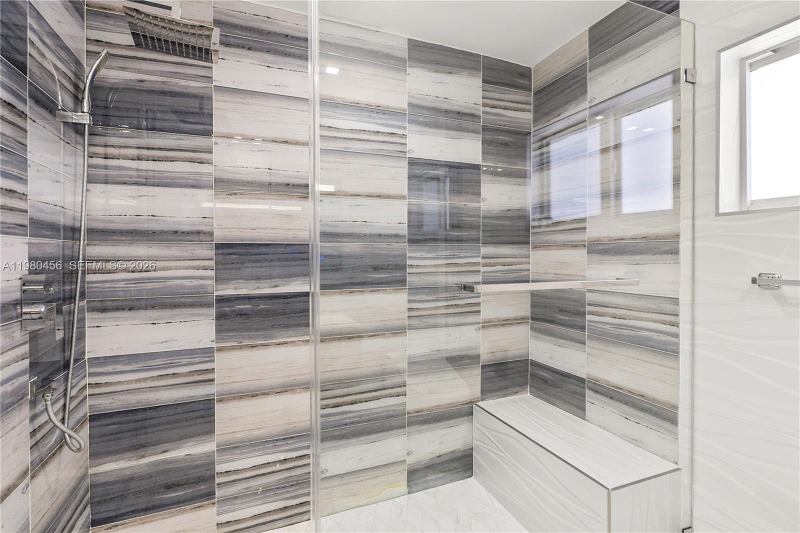 12401 Southwest 72nd Avenue Pinecrest, FL 33156 - Photo 17 of 35 a bathroom with a shower