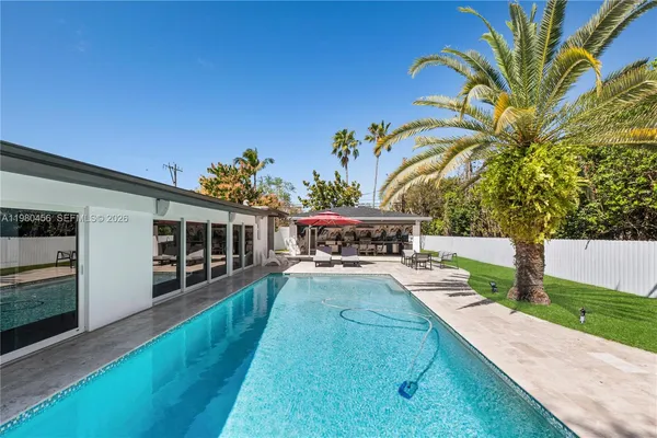 a view of a backyard with a garden