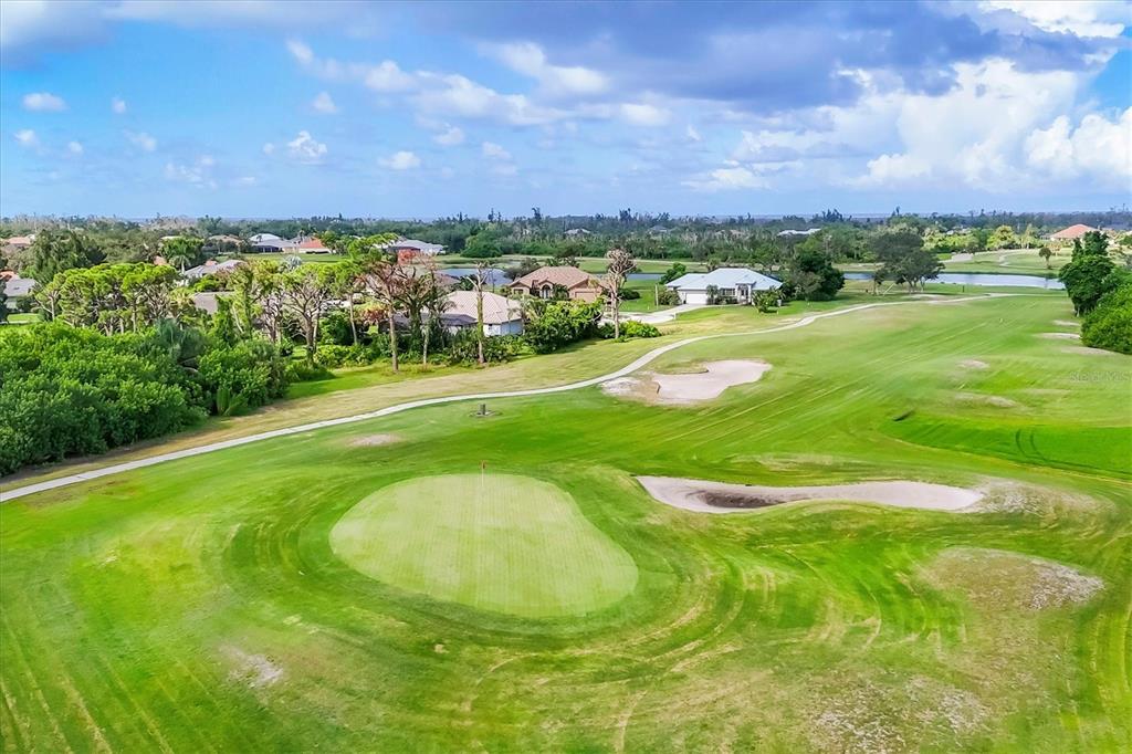 4 Windward Way Placida, FL 33946 - Photo 39 of 39 a view of a golf course with a lake