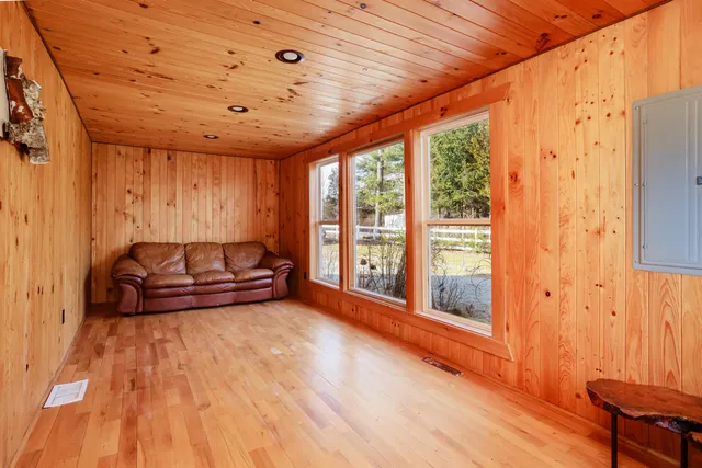 a swimming pool with outdoor seating