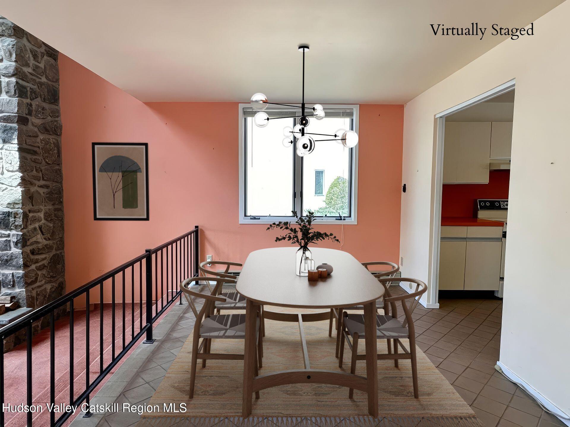 260 Pines Drive, Unit 82 Roxbury, NY 12421 - Photo 11 of 31 a view of a dining room with furniture and window