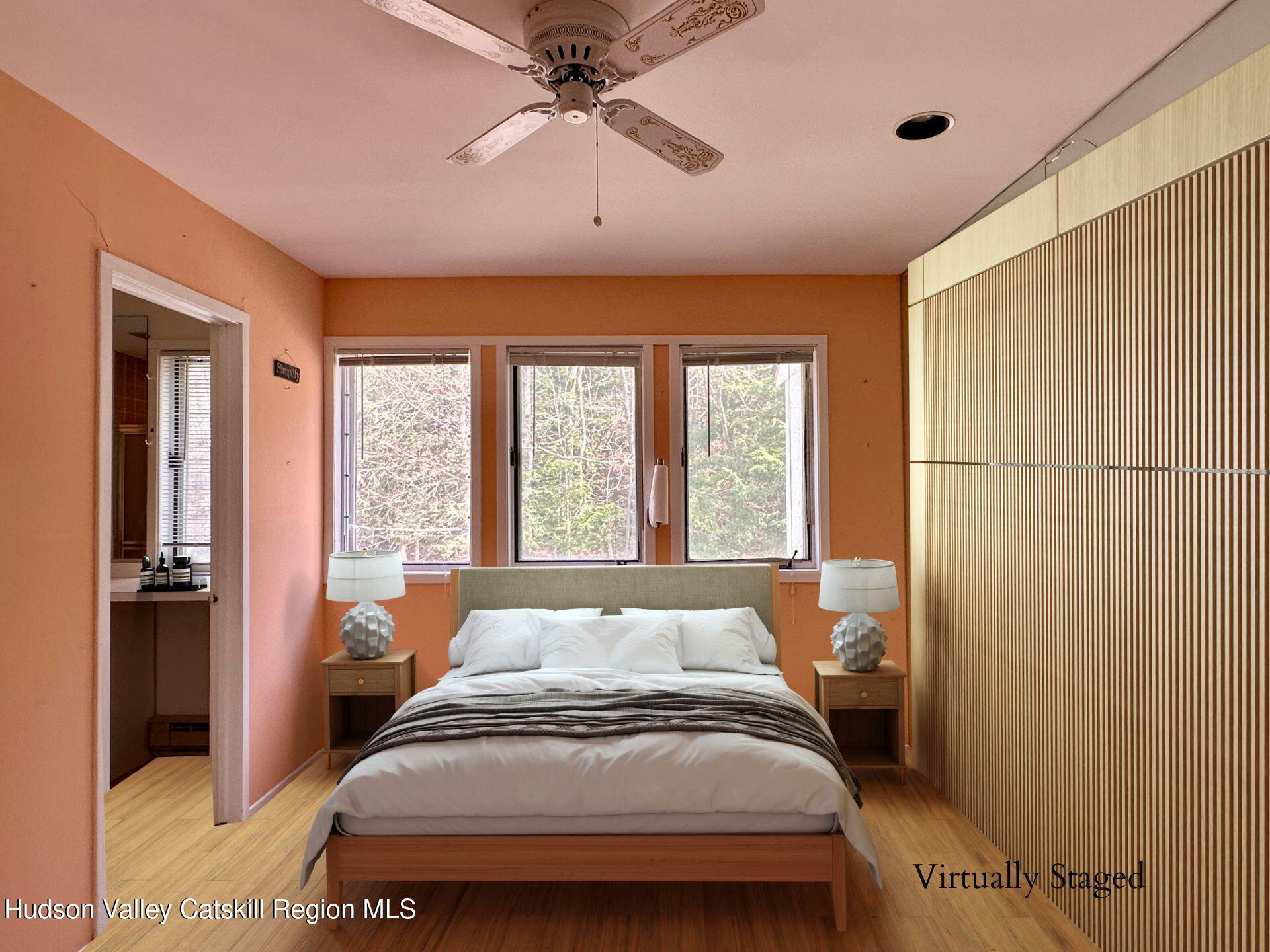 260 Pines Drive, Unit 82 Roxbury, NY 12421 - Photo 19 of 31 a bedroom with a bed and a window