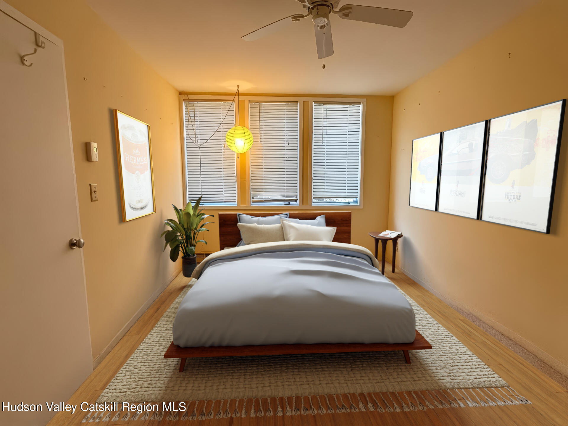 260 Pines Drive, Unit 82 Roxbury, NY 12421 - Photo 22 of 31 a bedroom with a large bed and a chandelier