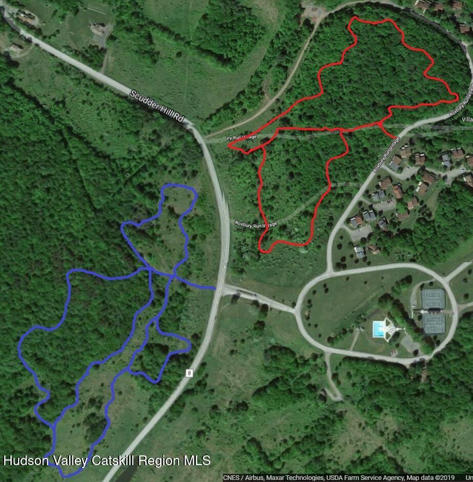 260 Pines Drive, Unit 82 Roxbury, NY 12421 - Photo 29 of 31 an aerial view of a house