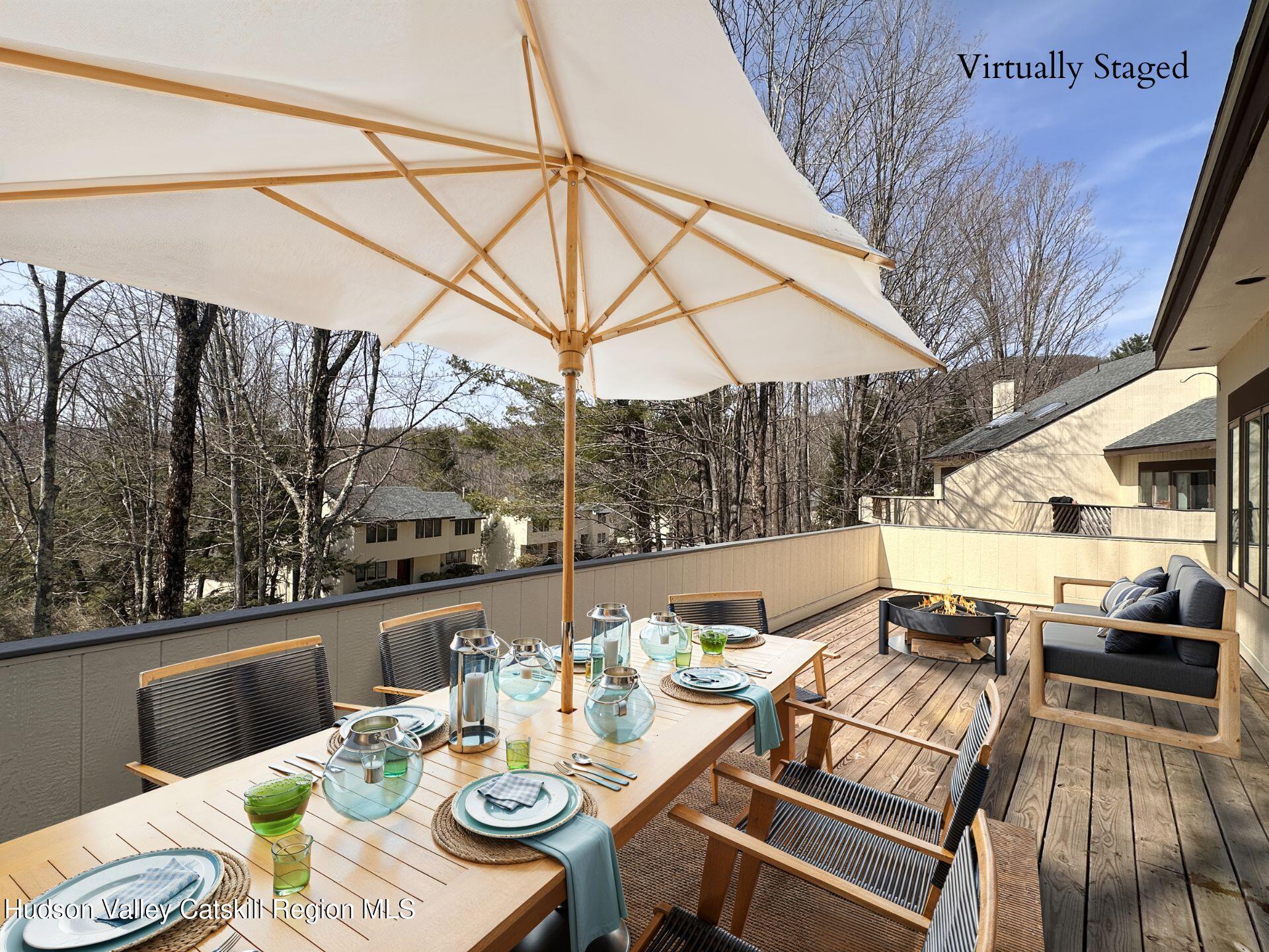 260 Pines Drive, Unit 82 Roxbury, NY 12421 - Photo 3 of 31 a view of a patio with furniture