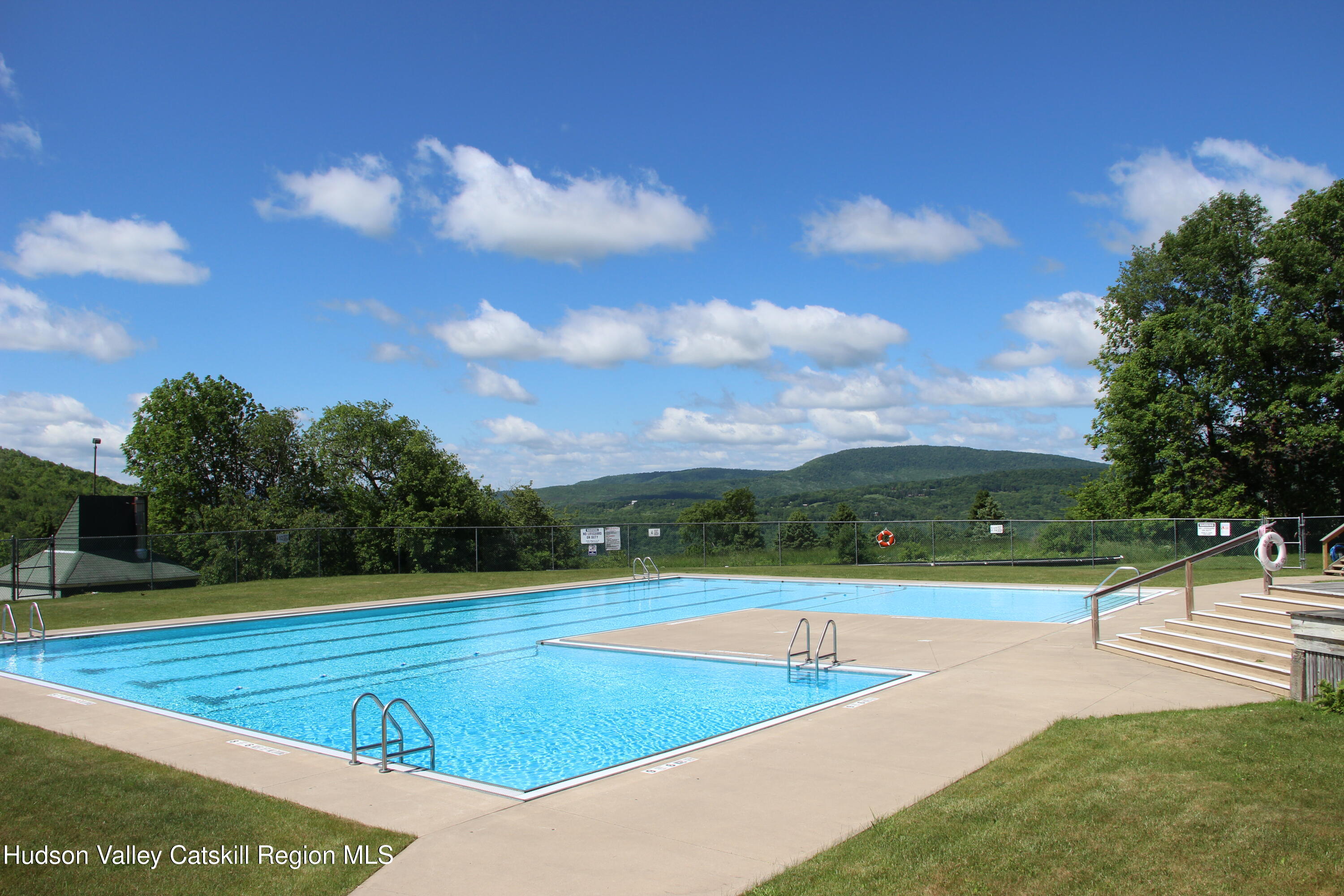 260 Pines Drive, Unit 82 Roxbury, NY 12421 - Photo 5 of 31 a view of an outdoor space and tennis court