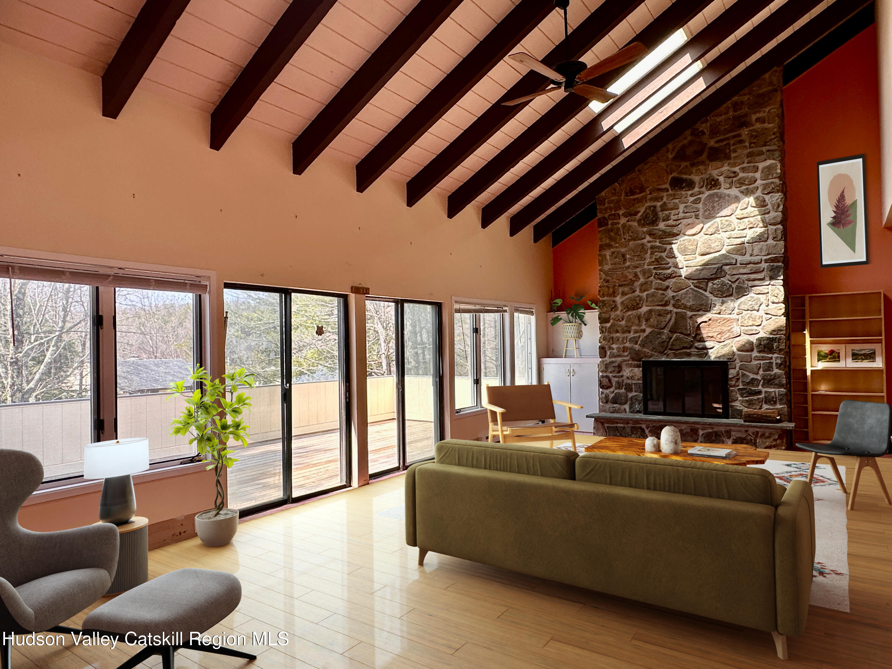 260 Pines Drive, Unit 82 Roxbury, NY 12421 - Photo 7 of 31 a living room with furniture and a floor to ceiling window