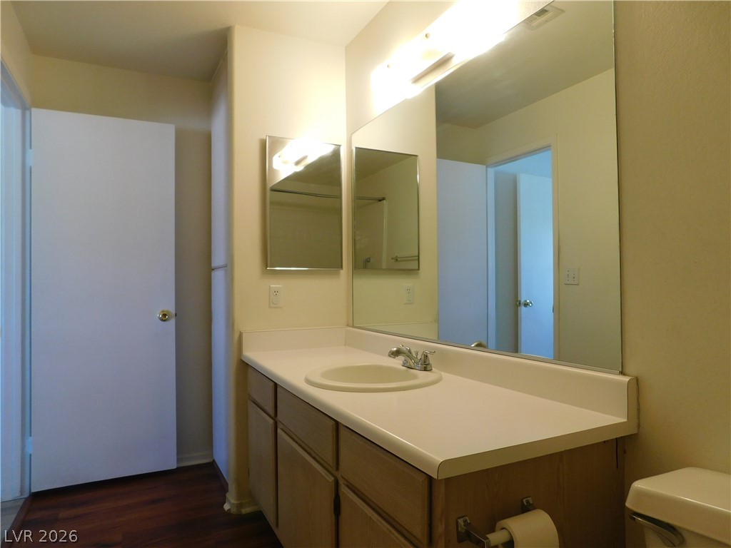 5221 South Lindell Road, Unit 202 Las Vegas, NV 89118 - Photo 15 of 28 A well-appointed vanity with a large mirror and ample counter space completes this bathroom.