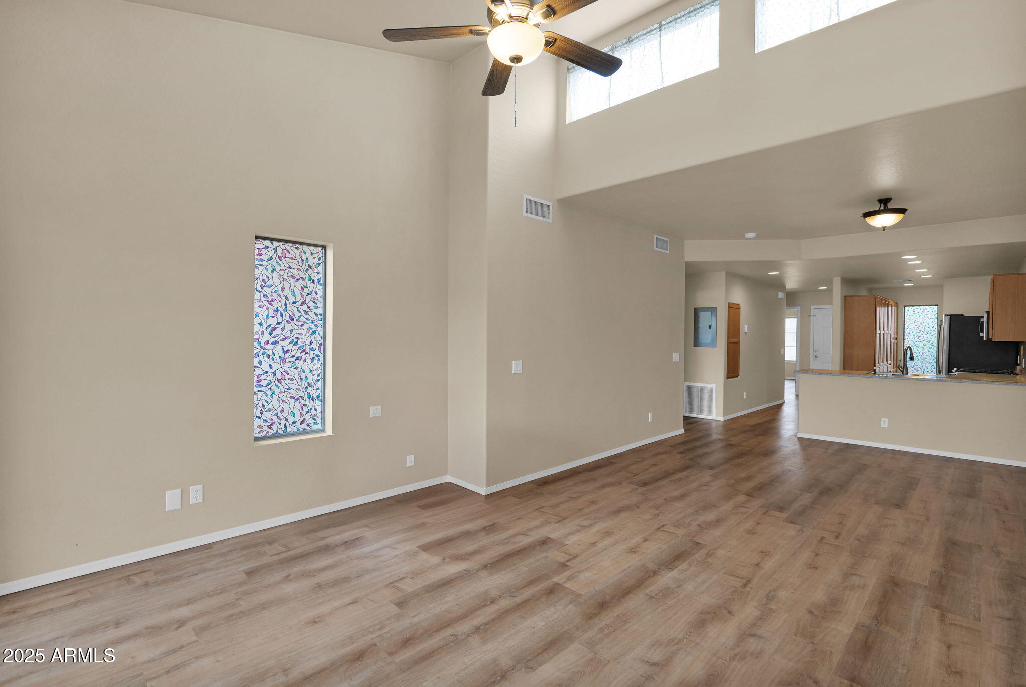 205 North 74th Street, Unit 260 Mesa, AZ 85207 - Photo 11 of 37 wooden floor in an empty room with a window