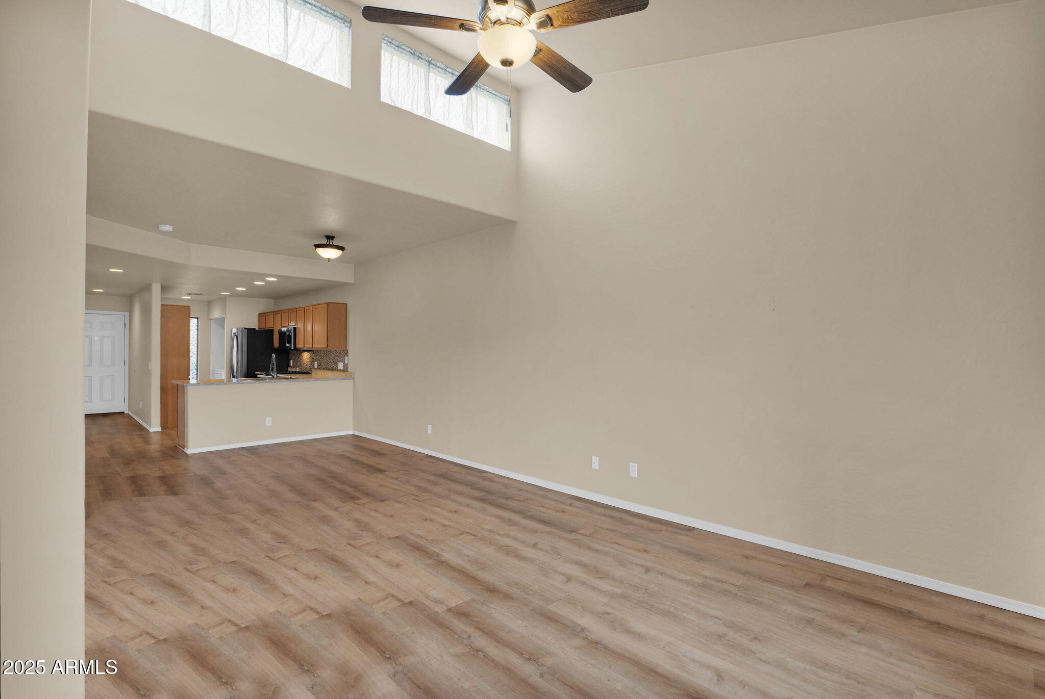 205 North 74th Street, Unit 260 Mesa, AZ 85207 - Photo 13 of 37 wooden floor in an empty room with a window
