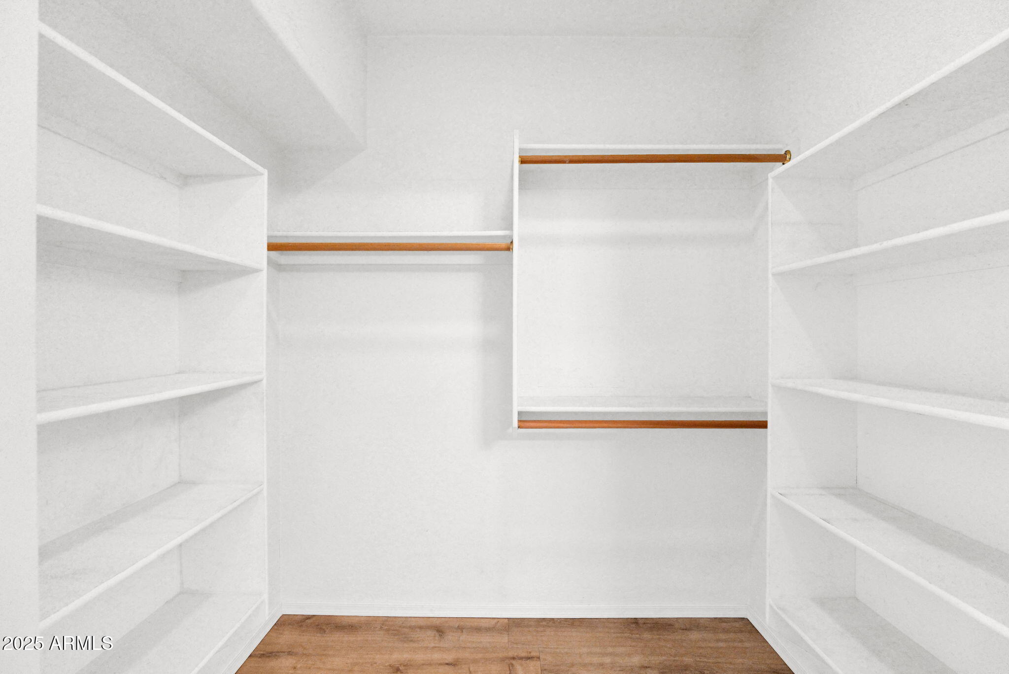 205 North 74th Street, Unit 260 Mesa, AZ 85207 - Photo 18 of 37 a view of walk in closet with empty racks