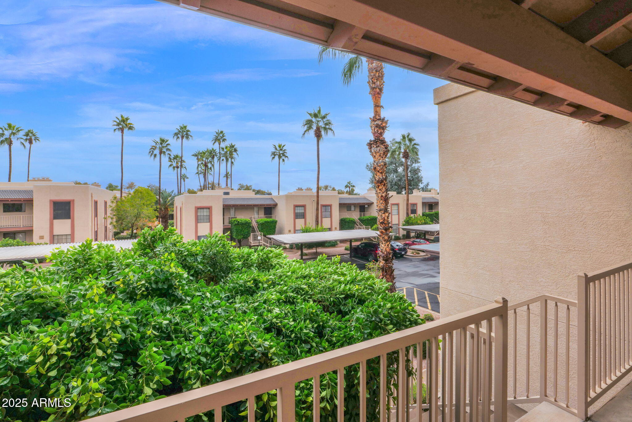 205 North 74th Street, Unit 260 Mesa, AZ 85207 - Photo 23 of 37 a view of a balcony with an outdoor space