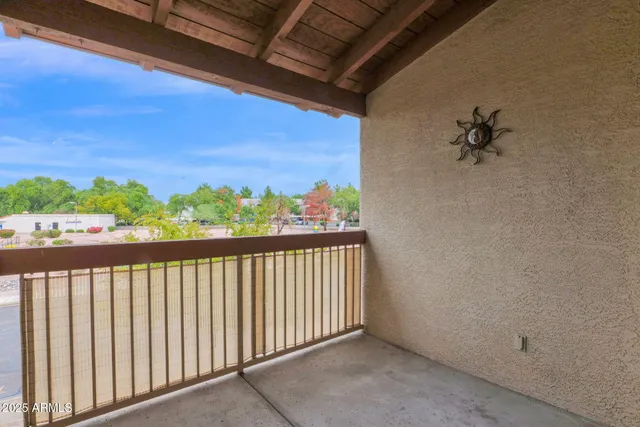 a view of a street from a balcony