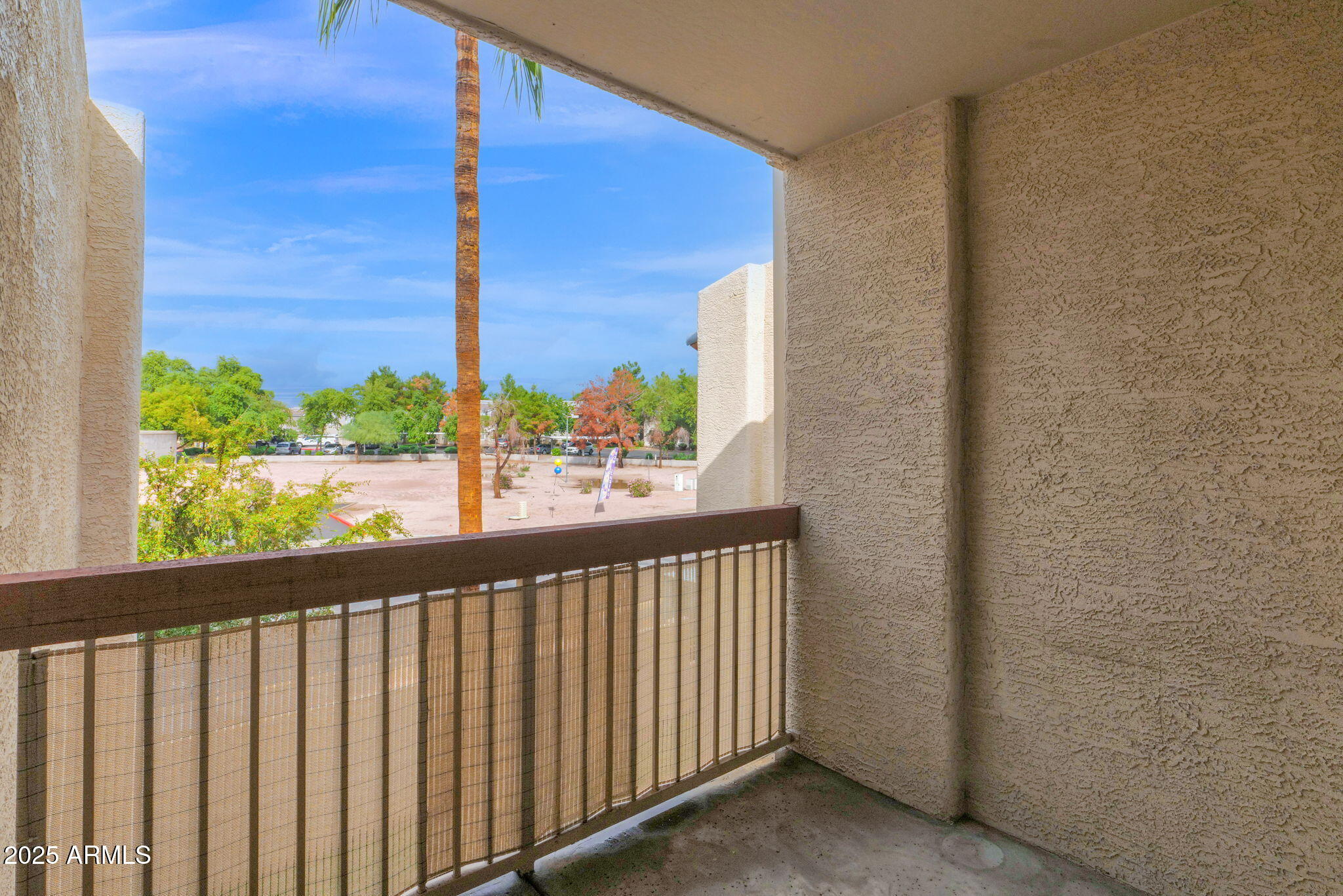205 North 74th Street, Unit 260 Mesa, AZ 85207 - Photo 28 of 37 a view of a street from a balcony