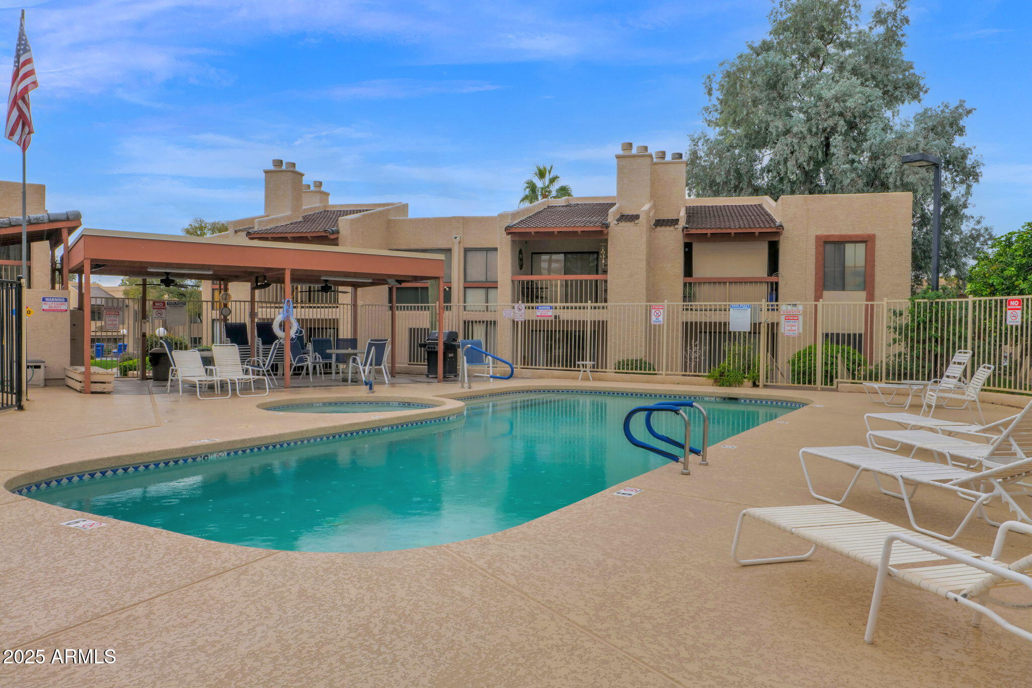 205 North 74th Street, Unit 260 Mesa, AZ 85207 - Photo 32 of 37 front view of a house with a yard