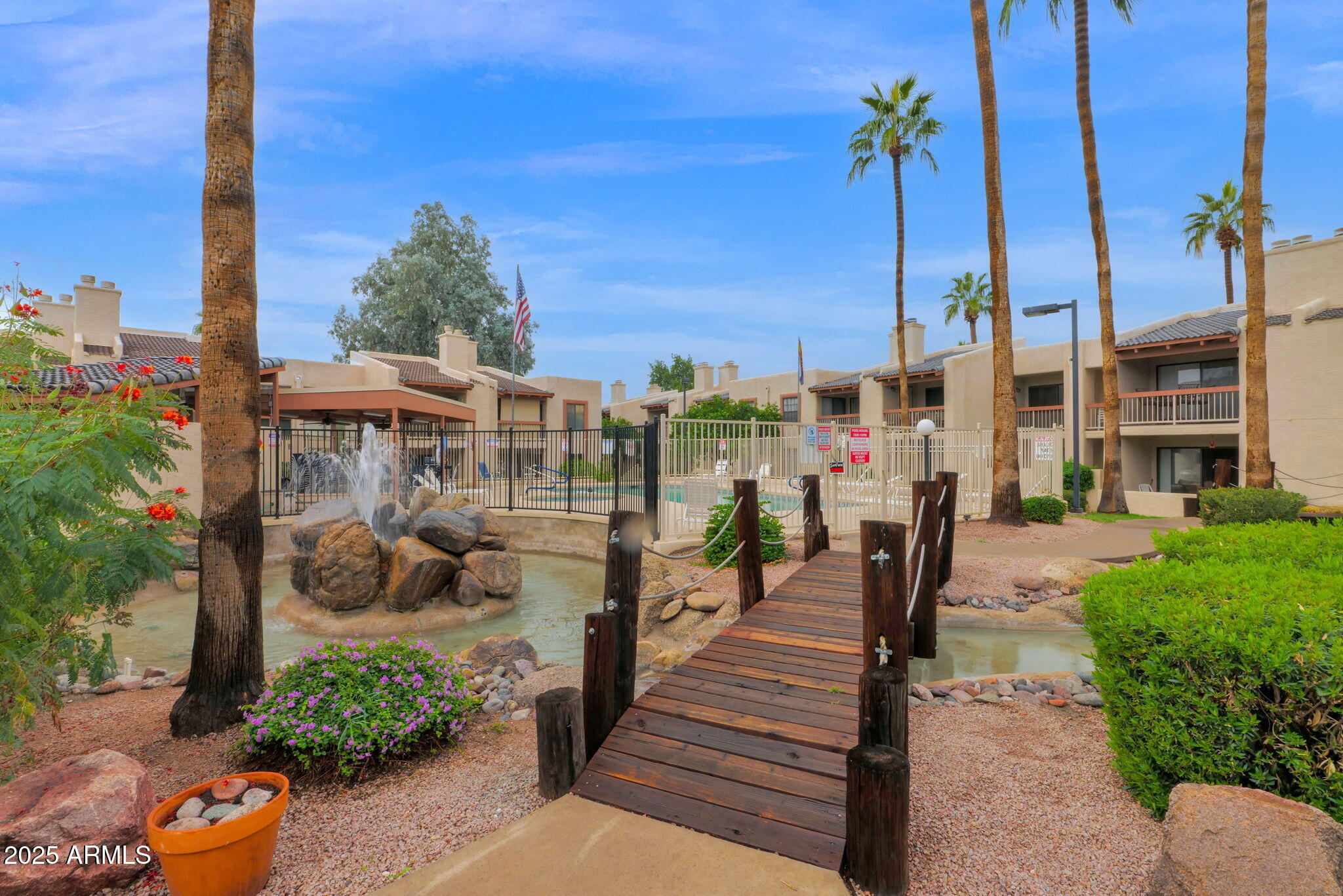 205 North 74th Street, Unit 260 Mesa, AZ 85207 - Photo 37 of 37 a view of a balcony with potted plants