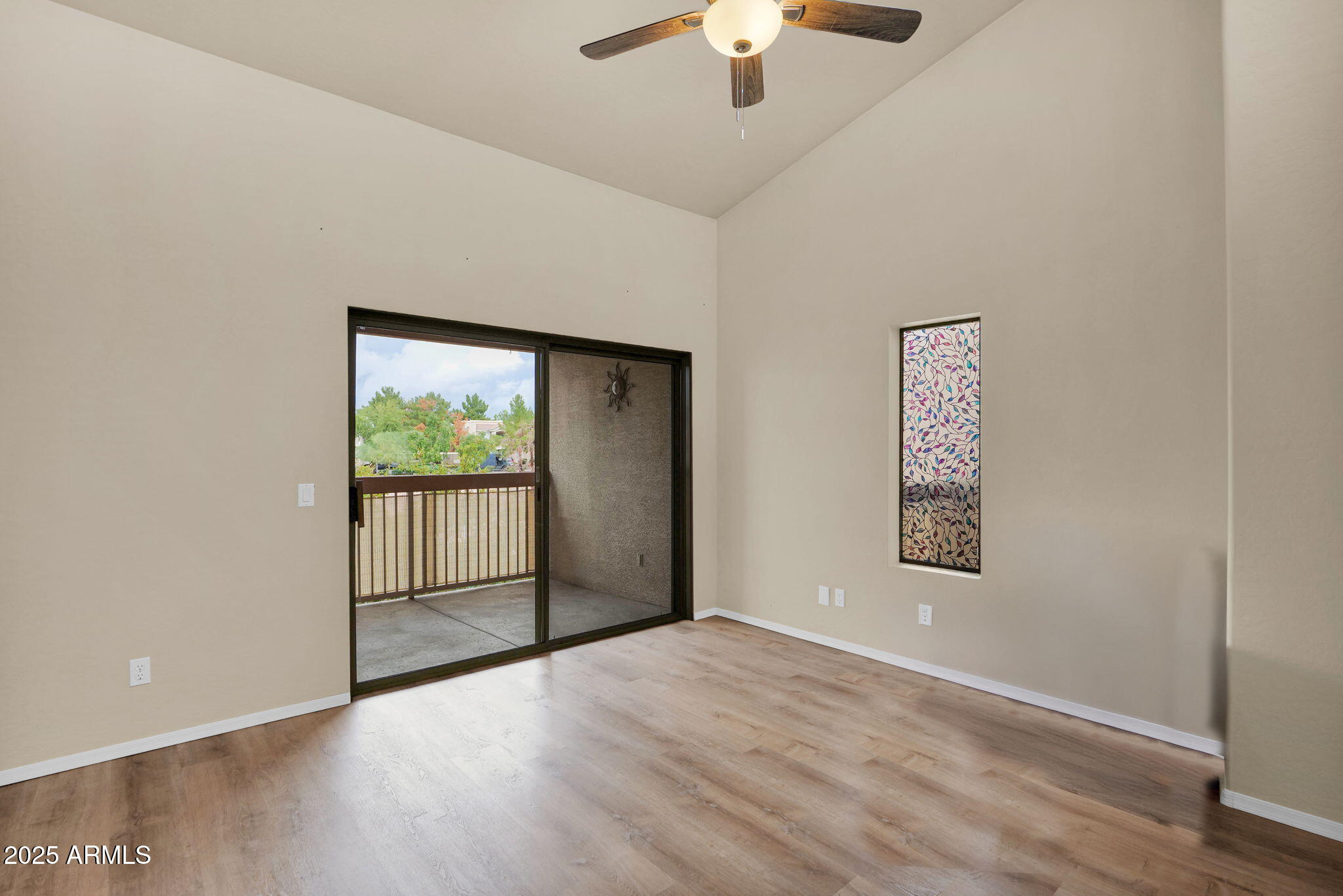 205 North 74th Street, Unit 260 Mesa, AZ 85207 - Photo 10 of 37 wooden floor in an empty room with a window
