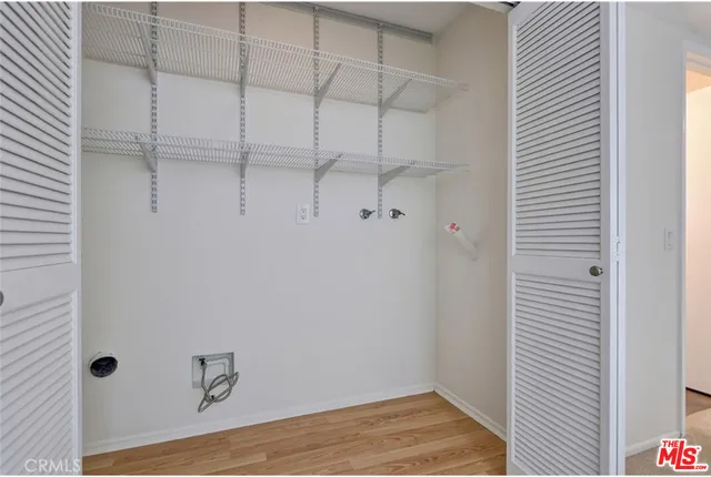 a view of a room with racks on the wall