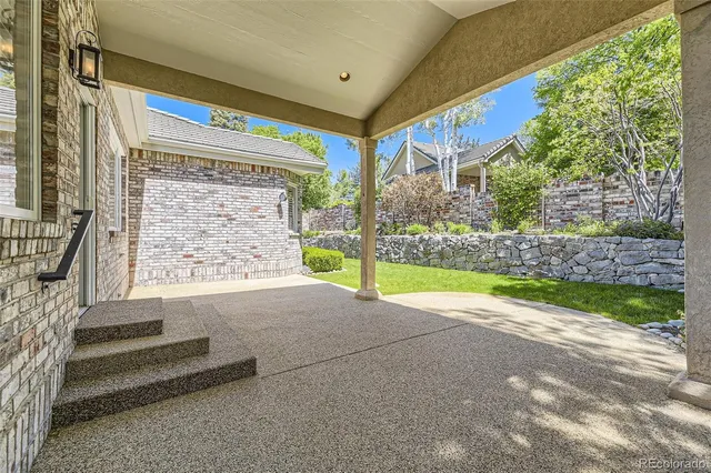 a view of a car park in front of a house