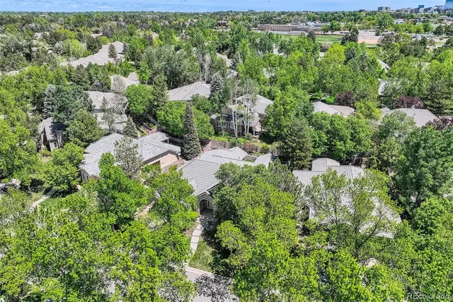 an aerial view of house with yard