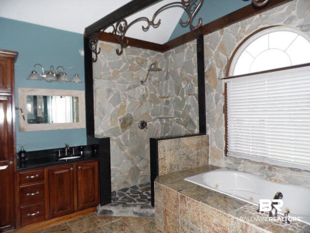 12360 Deer Ridge Drive Wilmer, AL 36587 - Photo 14 of 23 BEAUTIFUL SHOWER WITH STONE SURROUND